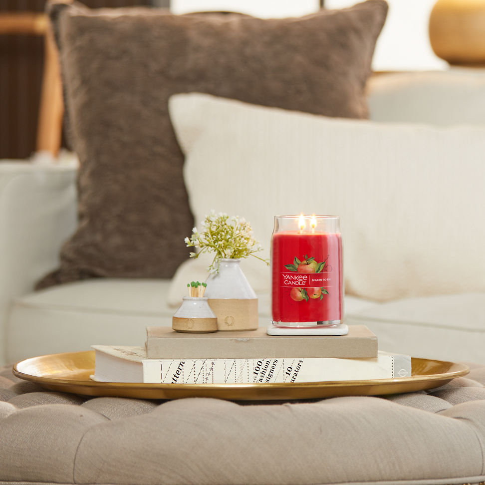 macintosh signature large jar candle on table