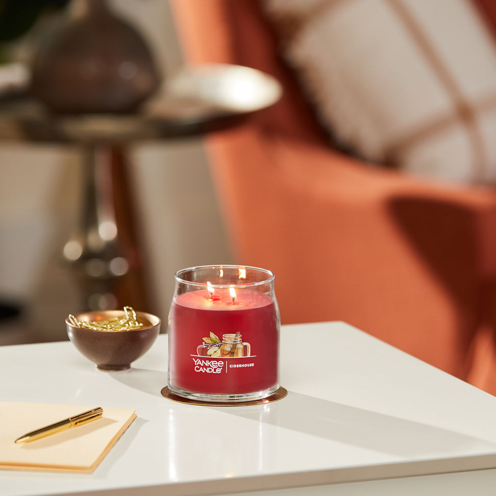 ciderhouse signature medium jar candle on table