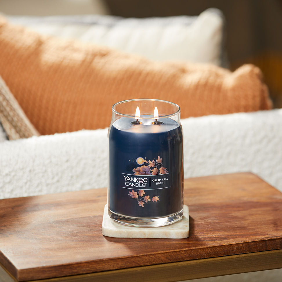 crisp fall night signature large jar candle on table