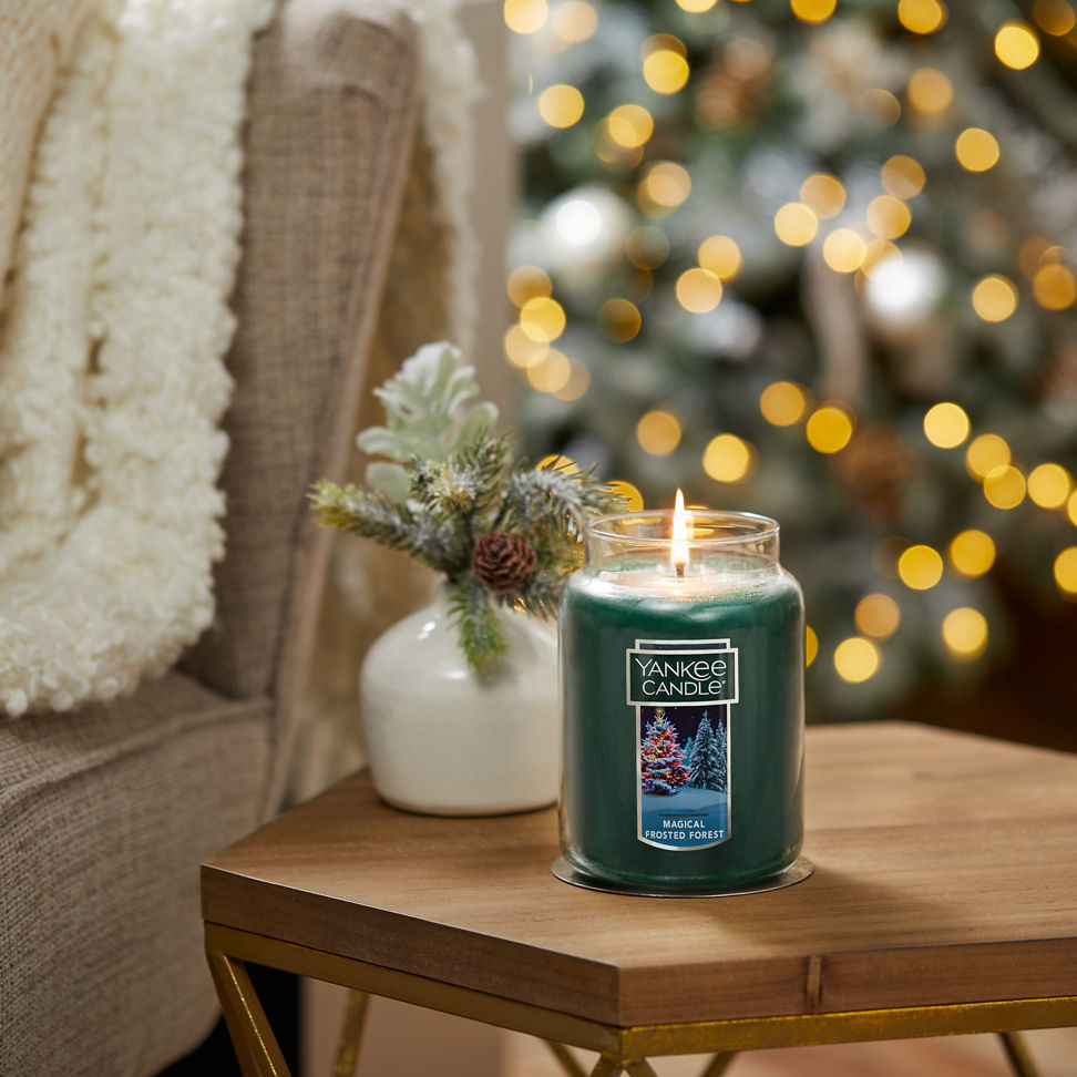 magical frosted forest original large jar candle on table