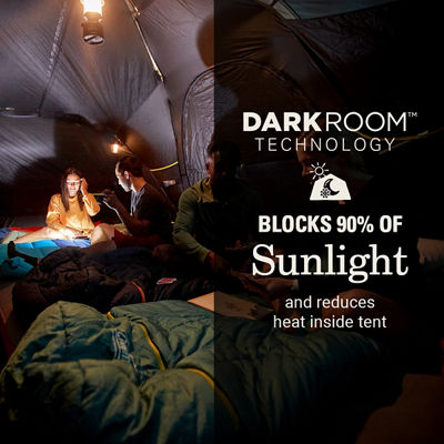 Three people inside tent that has Darkroom technology