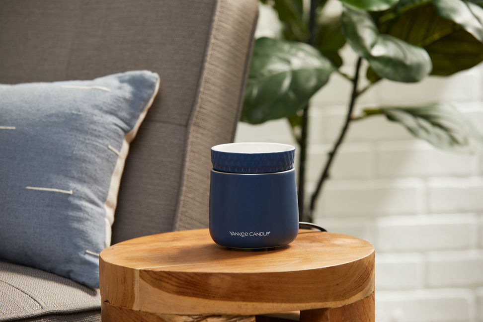 midnight wax melt warmer on table