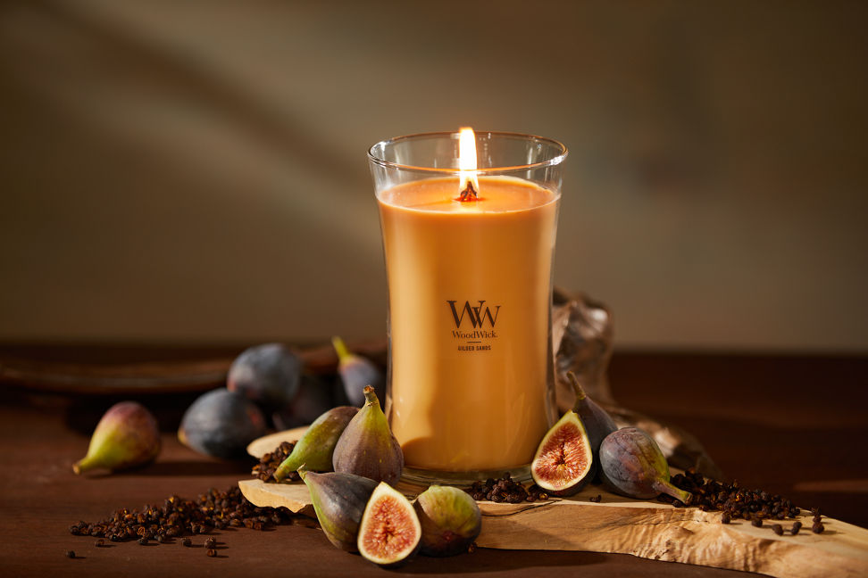 WoodWick Enchanted Destinations Collection Gilded Sands Large Hourglass Candle on a table