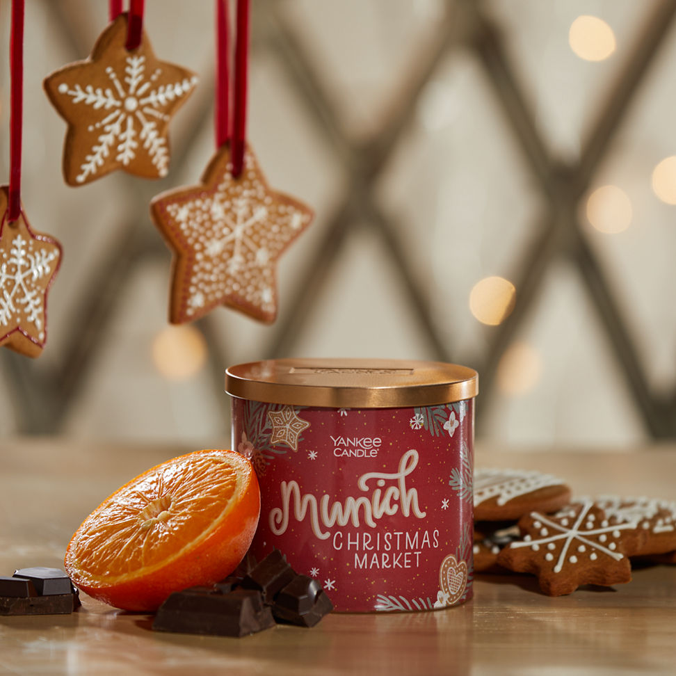 munich christmas market three wick candle with cookies, an orange, and chocolate