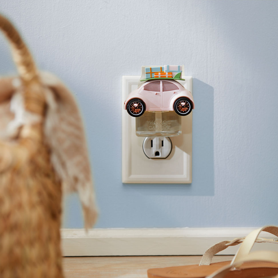 Spring Buggy ScentPlug Diffuser plugged into a wall