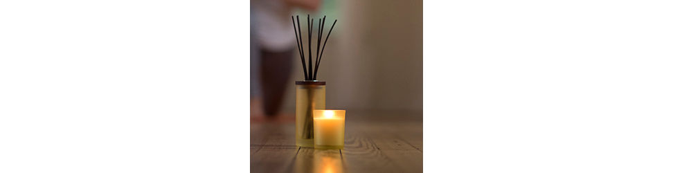 scented candle and reeds