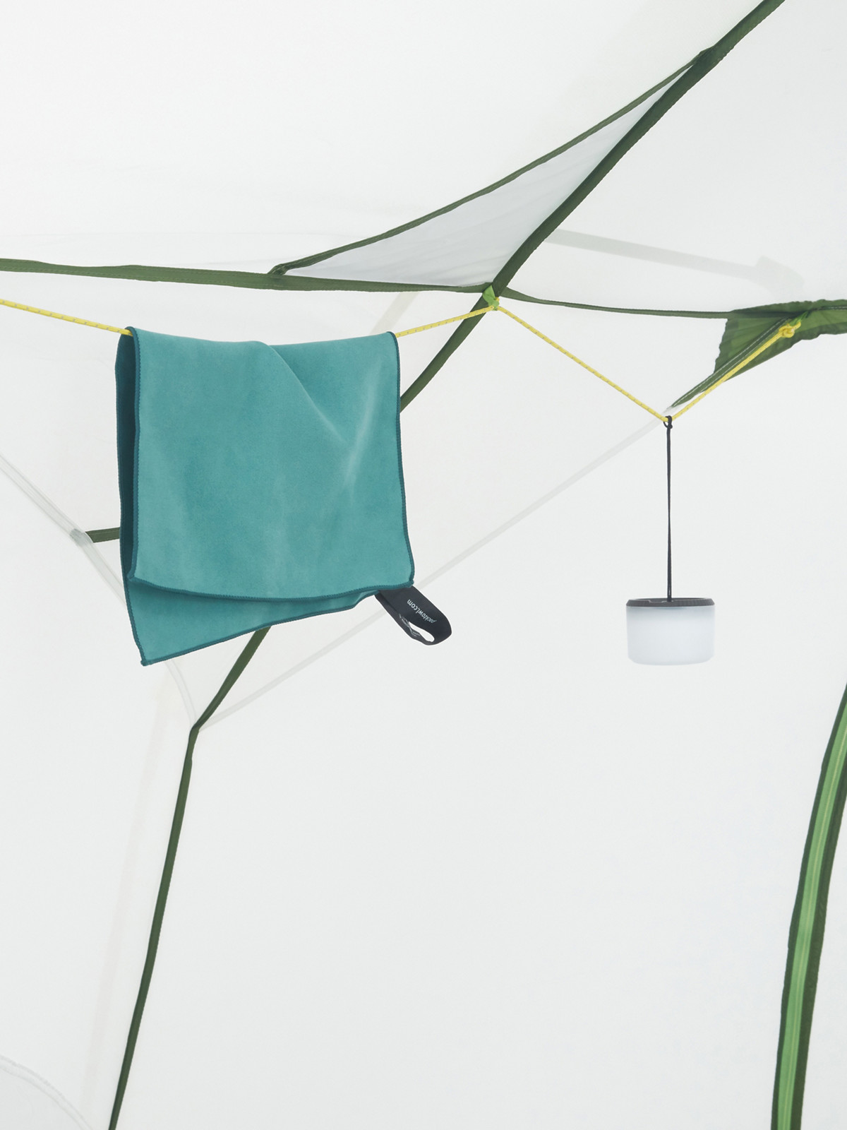 towel hanging on tether inside tent