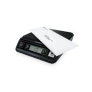 digital postal scale at an angle weighing mail image number 1