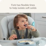 child using suction plate and utensils image number 3