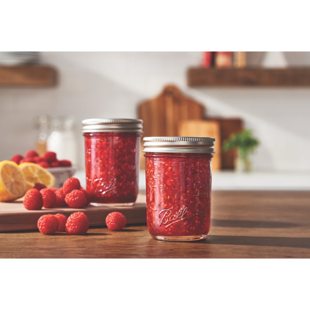 https://s7d1.scene7.com/is/image/NewellRubbermaid/9999681200-ball-jar-food-preserving-wave-1-quilted-crystal-jelly-8oz-raspberry-freezer-jam-beauty-lifestyle-1-1?wid=1000&hei=1000