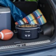 slow cooker with food in car trunk image number 6