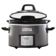 a slow cooker with lid partial open image number 0