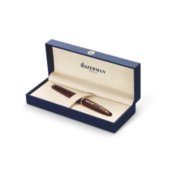 A capped Carene pen with gold trim in a gift box. image number 2