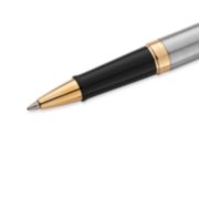 Closeup of a Hemisphere rollerball pen tip and barrel with gold trim. image number 4