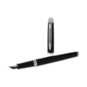 A Hemisphere fountain pen with chrome trim laid next to an upright pen cap. image number 3