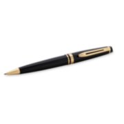 An Expert ballpoint pen with gold trim laid on its side. image number 2