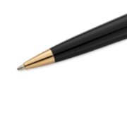Closeup of an Expert ballpoint pen tip and barrel with gold trim. image number 5