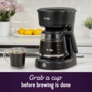 Grab a cup before brewing is done by coffeemaker image number 2
