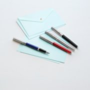 Four Hemisphere pens laid over envelopes. image number 5