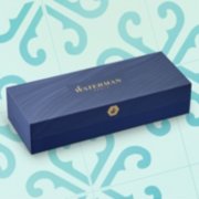 A closed gift box over a colorful background. image number 5