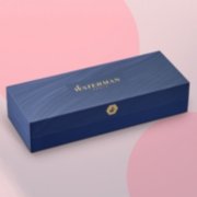 A closed gift box over a colorful background. image number 4