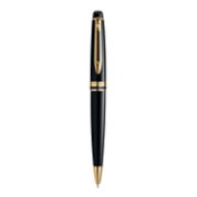 An Expert ballpoint pen with gold trim stood upright with pen tip pointing down. image number 0