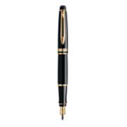 An Expert fountain pen with gold trim stood upright with nib pointing down. image number 0