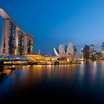 Marina Bay waterfront and ArtScience Museum in Singapore at night