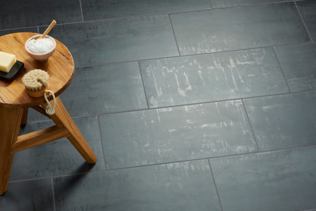 A black metal-look industrial style floor.