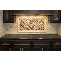 Thumbnail image of Backsplash area tiled in travertine subway tile with a mosaic deco framed in matching travertine.  Set above a granite tiled top.