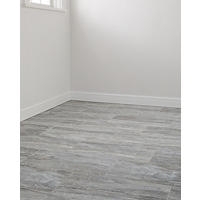 Thumbnail image of With a cool grey background dappled with brown and blue tones, this porcelain tile offers a spa-like appearance. 