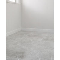 Thumbnail image of Room featuring large porcelain floor tile giving modern charm in a dark grey marbling and veining as a natural look to the home.