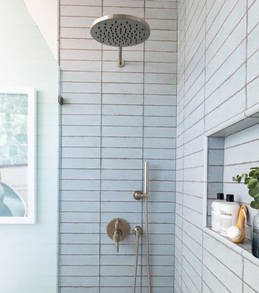 Blue tiled shower.