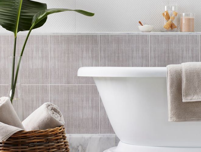 Bathroom with textured tile inspired by fabric.