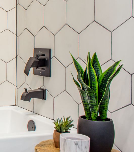 white hexagon wall tiles bathroom area.