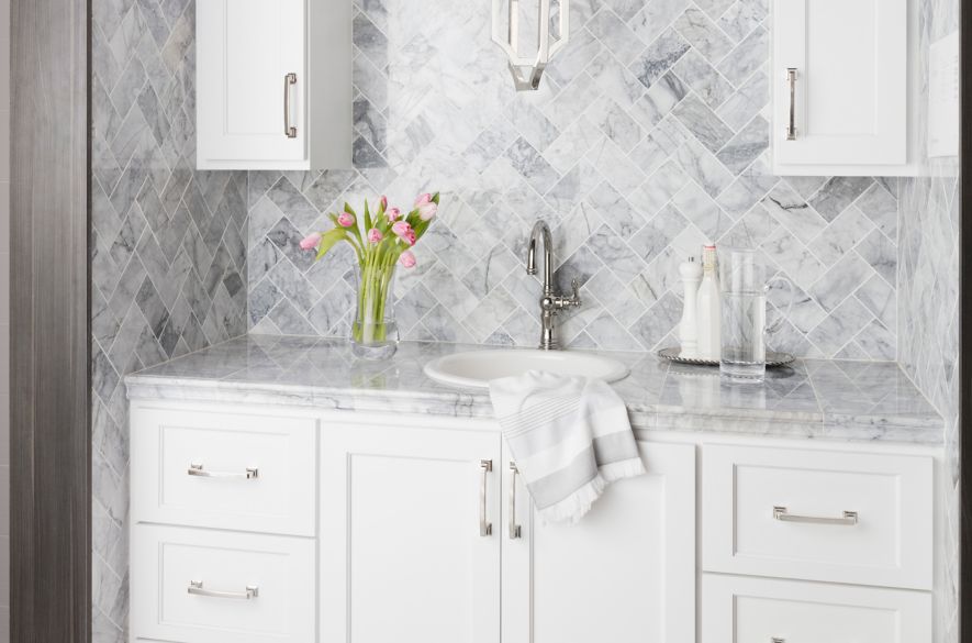 marble wall tiles in bathroom area.