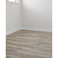 Thumbnail image of Room with tiled floor in a ceramic wood plank with matte finish.