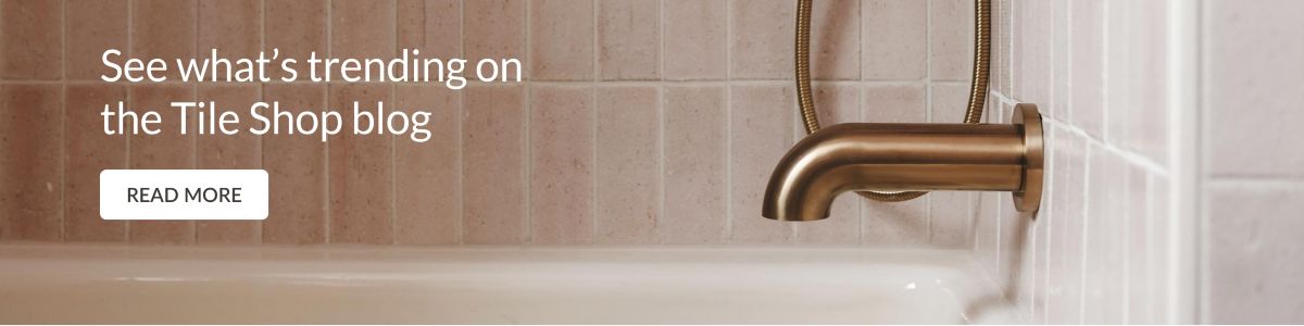 Sign up for See what's trending on the Tile Shop blog.  Close up of bronze bathtub faucet and pink subway tile.