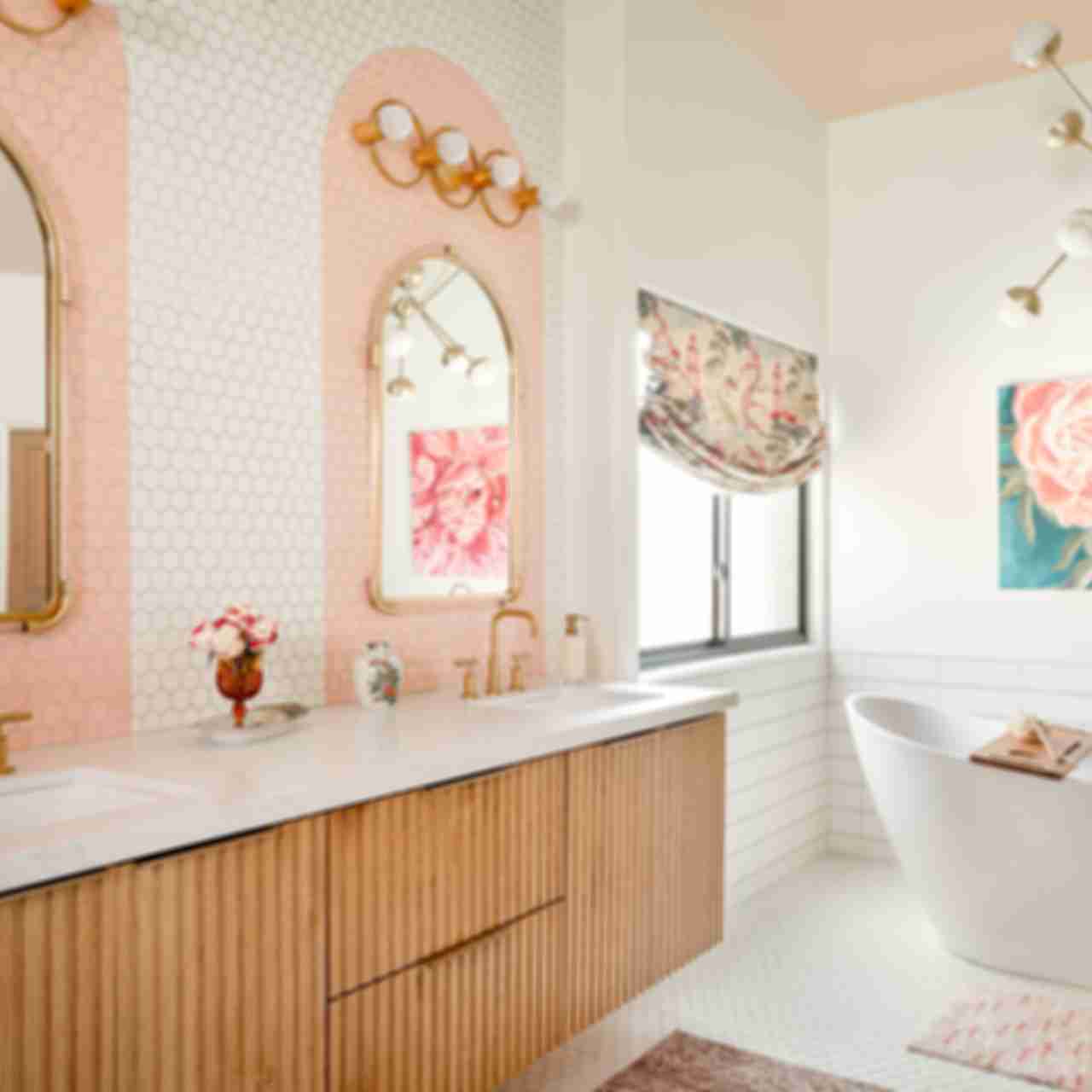 Bathroom with a white and pink tiled backsplash and white floor tile.