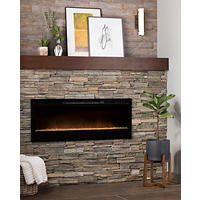 Thumbnail image of Fireplace surround with natural slate stacked stone a wood look porcelain tile above. All tile is natural colors of cool and warm tones.