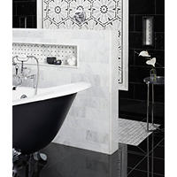 Thumbnail image of Unique bathroom area with crisp black tiles on floor and walls accented with natural white marble with soft whites creams and greys. large niche behind black and white soaker tub gives way to walk in shower being with large mosaic framed in profiles.