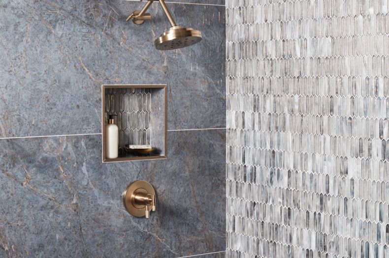 Shower with blue large-format tile.