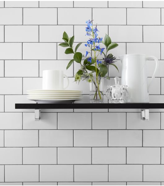 White subway tile kitchen wall floating shelves