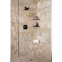 Thumbnail image of Walk In shower tiled in natural travertine stone with metallic profiles and corner shelves.