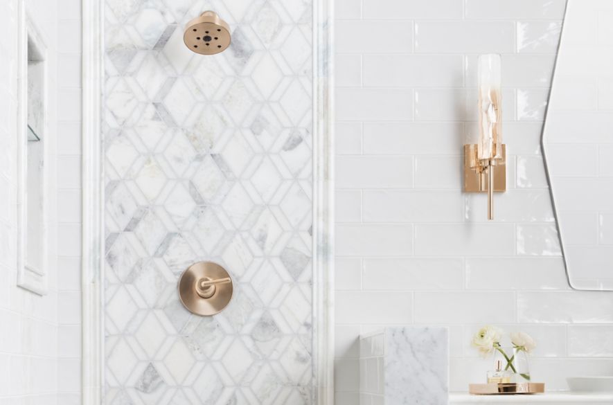 Shower accent featuring sophisticated marble mosaic tile.