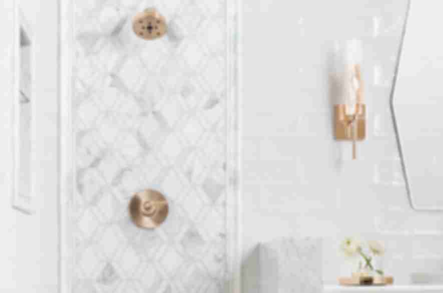 Shower accent featuring sophisticated marble mosaic tile.