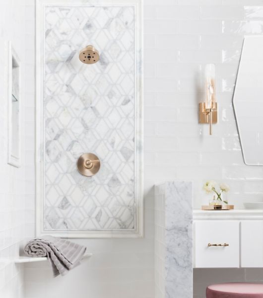 Shower accent featuring sophisticated marble mosaic tile.