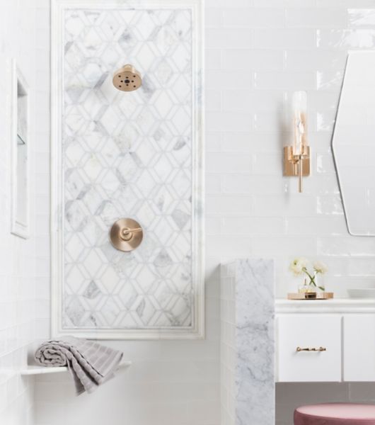 Shower accent featuring sophisticated marble mosaic tile.