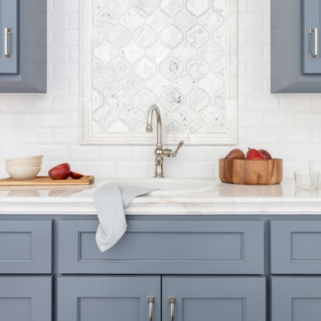 White Tile Wall Behind Sink in Kitchen