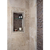 Thumbnail image of Natural stone shower area with glass and marble picture frame around dark oil rubbed bronze fixtures recessed niche has corresponding tile in neutral tans and dark Browns metal is also warm tones elegance and function is this shower area.